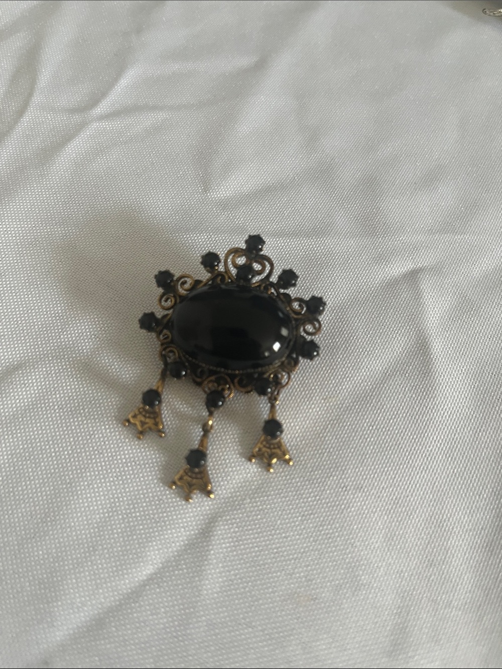 Original by Robert Gold-Tone Brooch with Black Glass Cabochon and Dangle Accents